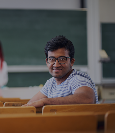 Indian student sitting in the lecture hall
