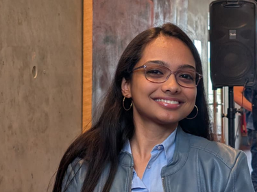 Blogger Upasana smiles at the camera.